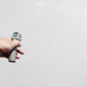 Taking the temperature of a recently-whitened pavement in LA. Image: Nate Berg